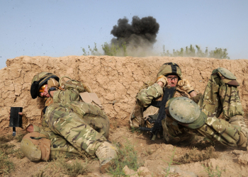 Image shows: Explosives and IED components being destroyed by members from the Counter IED task force on day two of Op TOR SHEZADA.In the foreground we can see Major Jones RLC an ATO from the C-IED taskforce (left) and Army photographer Sergeant Tom Robinson RLC (right).Soldiers serving with Somme Company, the 1st Battalion The Duke of LancasterÕs Regiment continued to clear compounds in Taliban held villages in the vicinity of Sayedebad, central Helmand in the early hours of this morning. The move resulted in a large find of Improvised Explosive Device (IED) components and bomb making equipment.