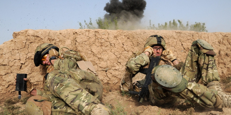 Image shows: Explosives and IED components being destroyed by members from the Counter IED task force on day two of Op TOR SHEZADA.
In the foreground we can see Major Jones RLC an ATO from the C-IED taskforce (left) and Army photographer Sergeant Tom Robinson RLC (right).
Soldiers serving with Somme Company, the 1st Battalion The Duke of LancasterÕs Regiment continued to clear compounds in Taliban held villages in the vicinity of Sayedebad, central Helmand in the early hours of this morning. The move resulted in a large find of Improvised Explosive Device (IED) components and bomb making equipment.