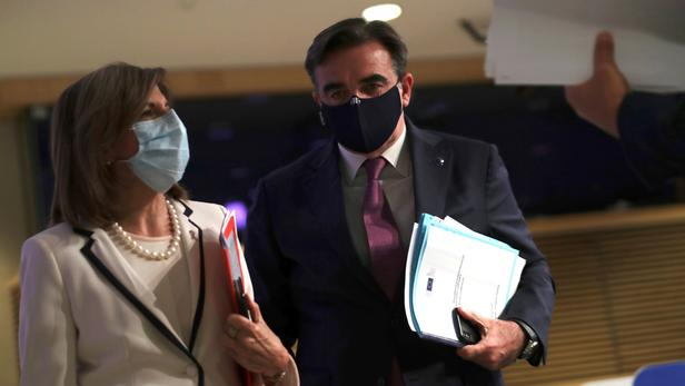 European Commission Vice-President Margaritis Schinas and European Health Commissioner Stella Kyriakides leave the podium after addressing a media conference on preparedness for possible future outbreaks of the coronavirus disease (COVID-19), at EU headquarters in Brussels, Belgium July 15, 2020. Francisco Seco/Pool via REUTERS