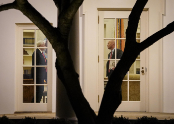WASHINGTON, DC - JANUARY 04: U.S. Vice President Mike Pence (L) and his Chief of Staff Marc Short stand in the Oval Office before U.S. President Donald Trump departs the White House on January 4, 2020 in Washington, DC. The president was scheduled for a rally in Dalton, Georgia tonight in support of Republican Senate run-off candidates Sen. Kelly Loeffler and Sen. David Perdue.  (Photo by Drew Angerer/Getty Images)