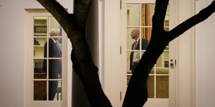 WASHINGTON, DC - JANUARY 04: U.S. Vice President Mike Pence (L) and his Chief of Staff Marc Short stand in the Oval Office before U.S. President Donald Trump departs the White House on January 4, 2020 in Washington, DC. The president was scheduled for a rally in Dalton, Georgia tonight in support of Republican Senate run-off candidates Sen. Kelly Loeffler and Sen. David Perdue.  (Photo by Drew Angerer/Getty Images)