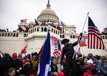 WASHINGTON, DC - JANUARY 06: Pro-Trump supporters storm the U.S. Capitol following a rally with President Donald Trump on January 6, 2021 in Washington, DC. Trump supporters gathered in the nation's capital today to protest the ratification of President-elect Joe Biden's Electoral College victory over President Trump in the 2020 election. (Photo by Samuel Corum/Getty Images)