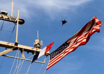 161025-N-FP878-227
MEDITERRANEAN SEA (Oct. 25, 2016) A French Rafale figher jet conducts a fly over of USS Ross (DDG 71) as the French aircraft carrier FS Charles de Gaulle (R 91) conducts flight operations Oct. 25, 2016.  Ross, an Arleigh Burke-class guided-missile destroyer, forward-deployed to Rota, Spain, is providing multi-warfare defense support to Charles de Gaulle carrier-based operations in the Eastern Mediterranean against identified ISIL positions in support of Operation Inherent Resolve.  (U.S. Navy photo by Petty Officer 1st Class Theron J. Godbold/Released)