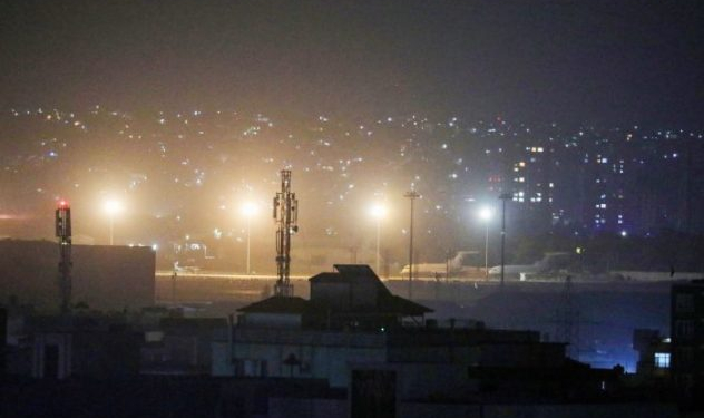 Planes are seen on the tarmac at the airport in Kabul late on August 30, 2021, hours ahead of a US deadline to complete its frenzied withdrawal from Afghanistan. (Photo by - / AFP) (Photo by -/AFP via Getty Images)
